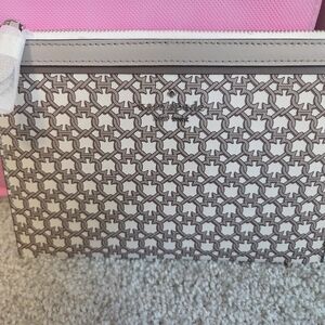 Coach Brown and White Clutch with Elegant Design